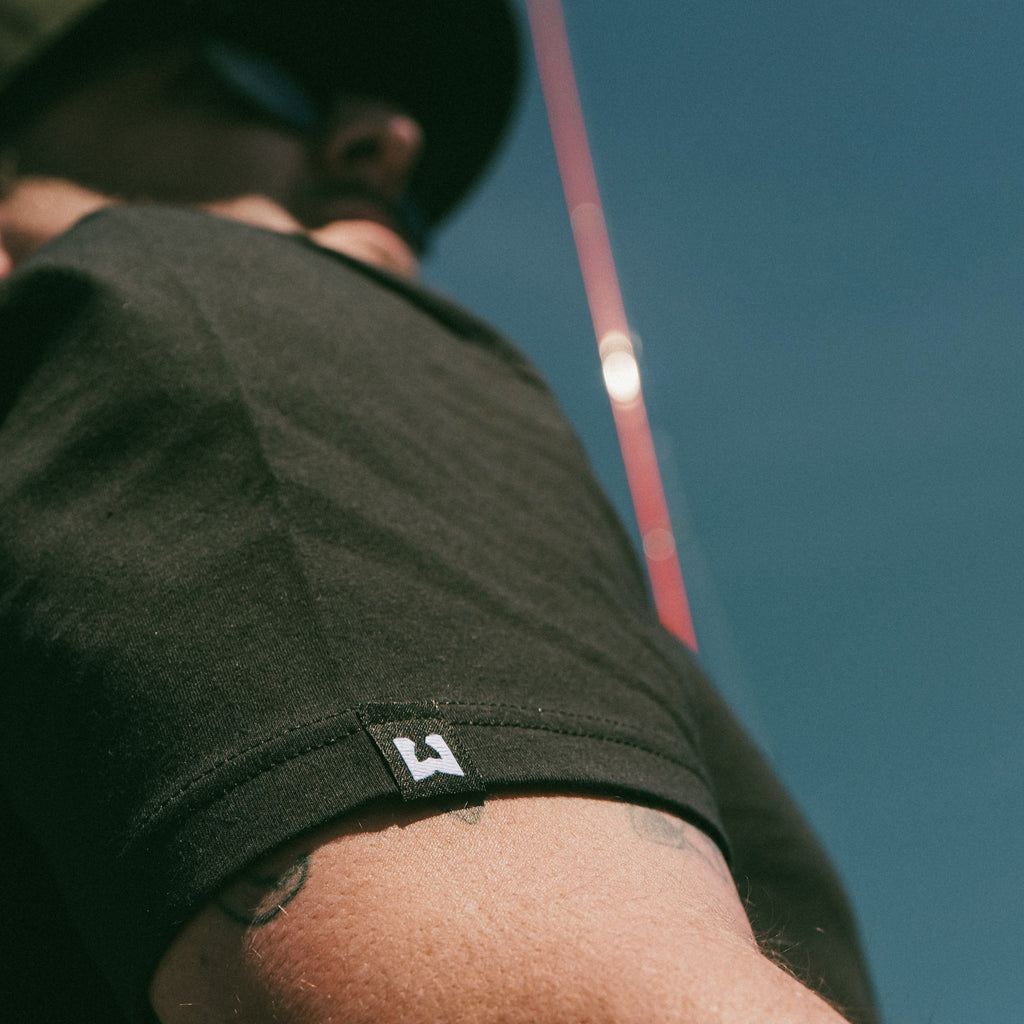 Wicked Bass signature tee for men woven label